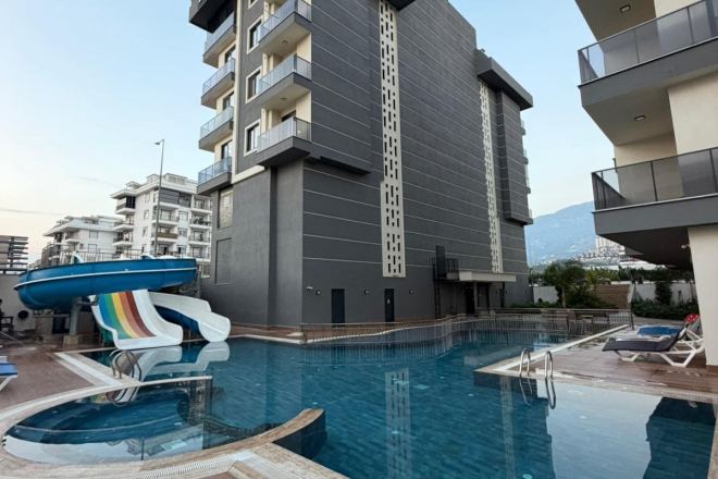 Купить меблированную квартиру 1+1 с видом на море в Каргыджаке — 55 м², 300 м до пляжа