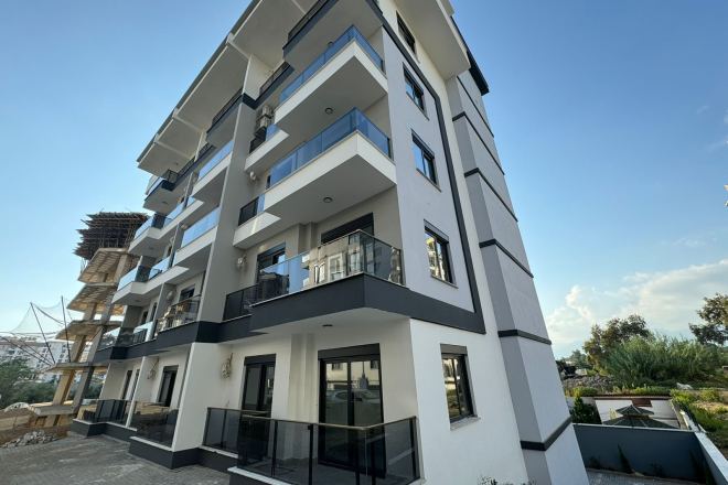 Квартира 1+1 в Махмутларе — новый дом 2026 года, 600 м до моря и цена 63 000 €