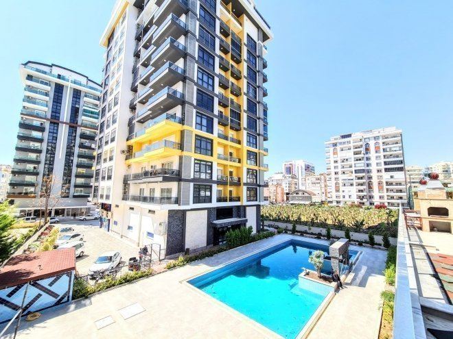 Просторная квартира 2+1 в Махмутларе — семейный формат, 125 м², комплекс с бассейнами и инфраструктурой