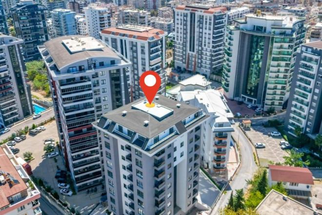 Светлая квартира с панорамными видами в новом доме Махмутлара для жизни и аренды