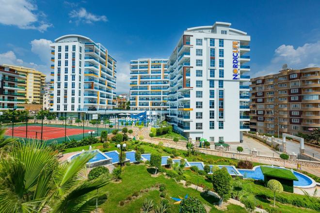 Купить квартиру 1+1 с панорамным видом в Тосмуре — 250 м до моря