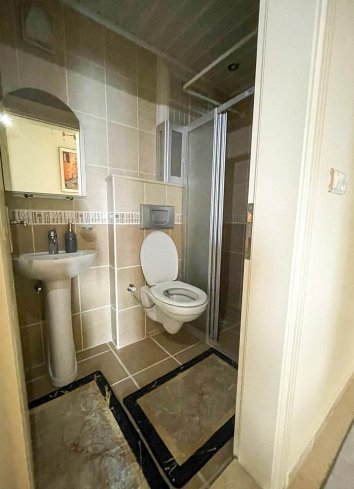 Великолепная двухкомнатная квартира с 2 ванными комнатами в районе Махмутлар