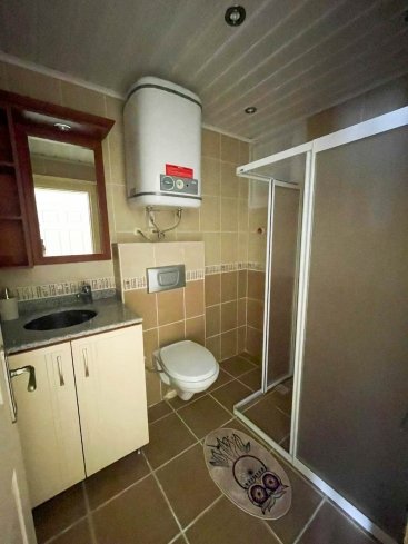 Великолепная двухкомнатная квартира с 2 ванными комнатами в районе Махмутлар