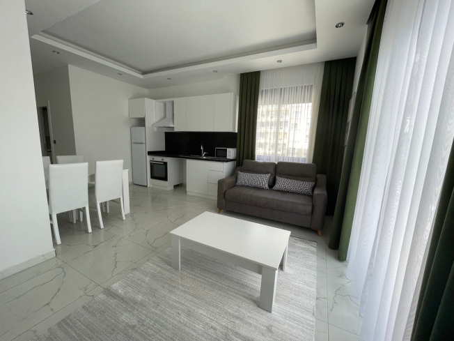 Аренда для отдыха квартиры 1+1 с красивым интерьером в Махмутлар