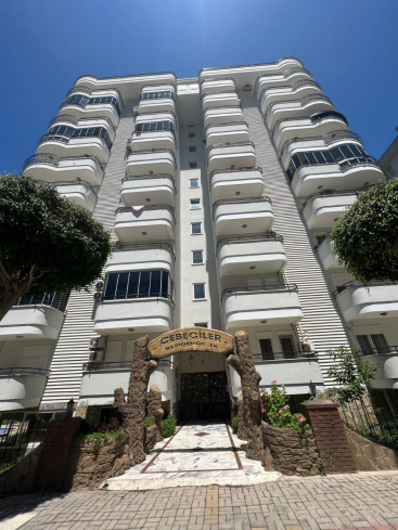 Квартира в центре Махмутлара на первом высоком этаже с видом на горы