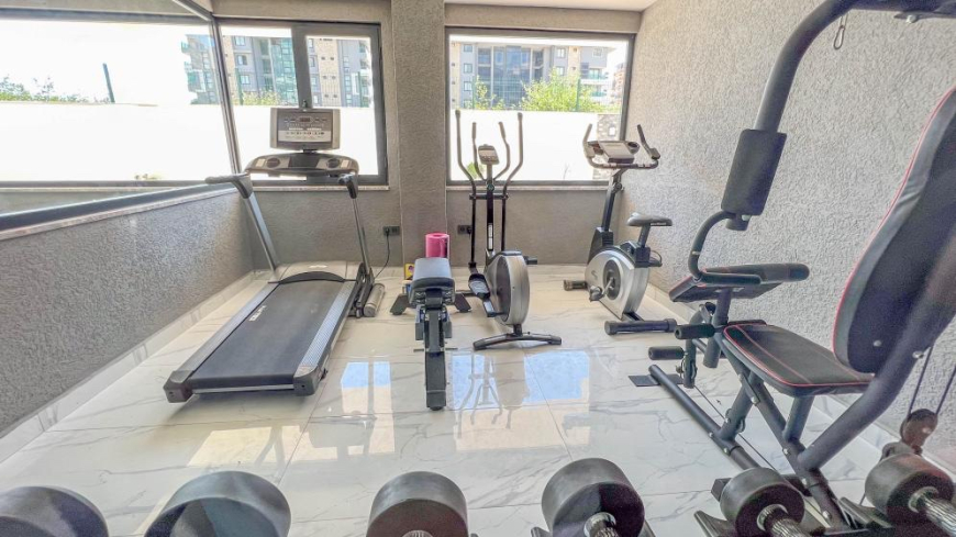 Современная квартира 1+1 рядом с морем в престижном районе Каргыджак