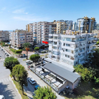 Продажа видовой квартиры 2+1 с мебелью и бытовой техникой всего в 200 метрах от моря
