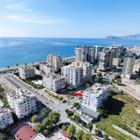 Продажа видовой квартиры 2+1 с мебелью и бытовой техникой всего в 200 метрах от моря