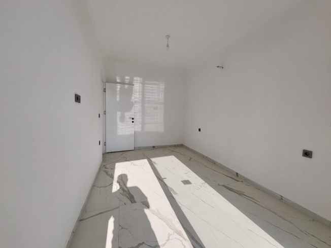 Новая двухкомнатная квартира в Махмутларе по выгодной цене