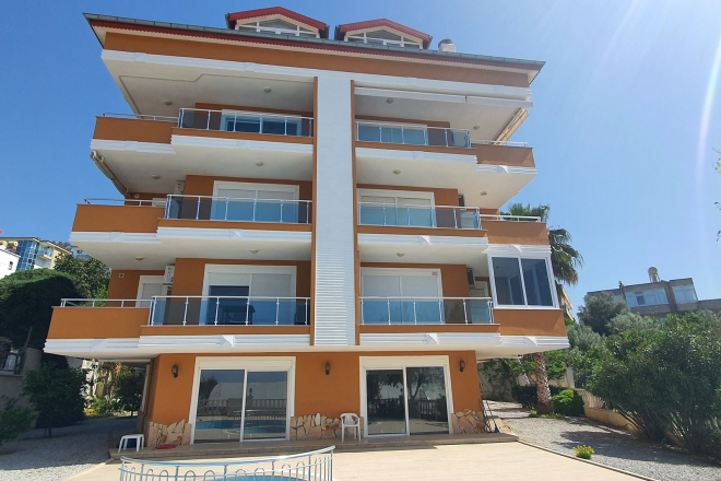 Двухэтажная 4+1 меблированная квартира с видом на море и горы в Демирташ