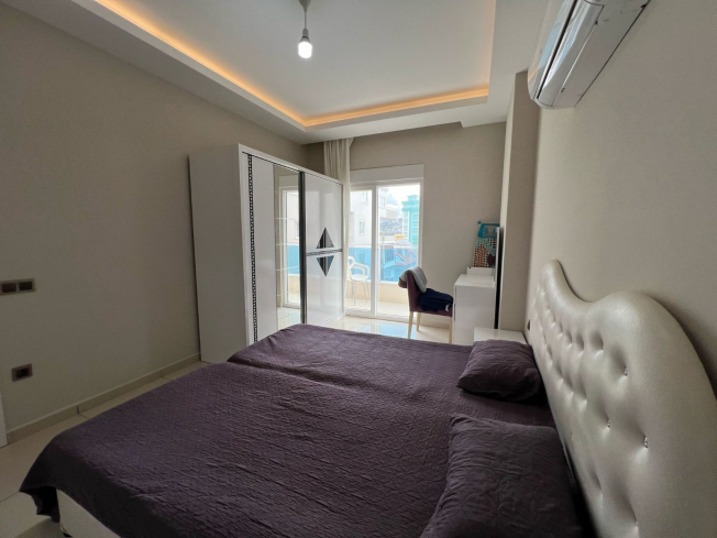 Трехкомнатная меблированная квартира на высоком этаже с видом на море в Махмутларе