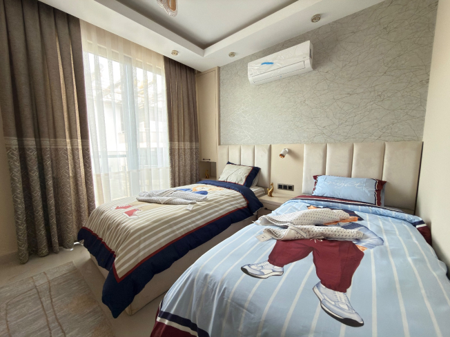 Просторная квартира 2+1 с панорамным видом на море в самом центре Махмутлара!