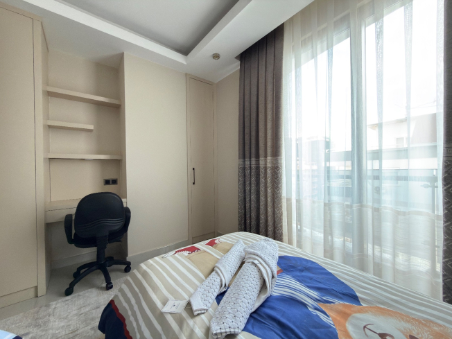 Просторная квартира 2+1 с панорамным видом на море в самом центре Махмутлара!