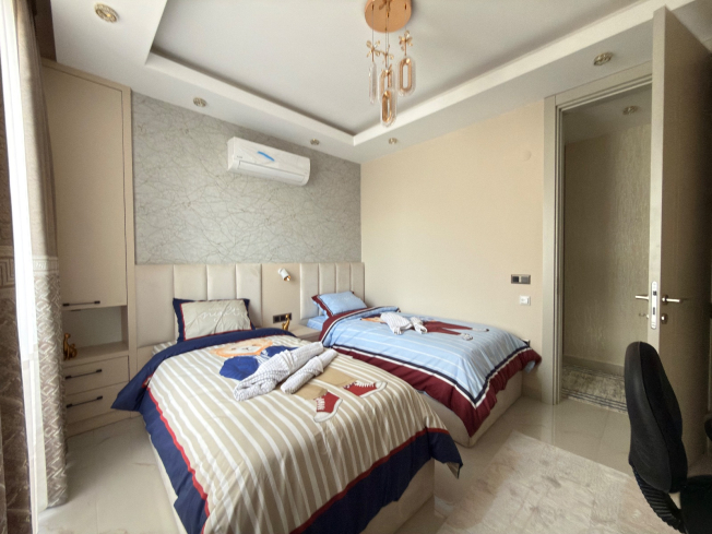 Просторная квартира 2+1 с панорамным видом на море в самом центре Махмутлара!