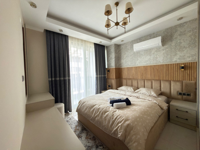 Просторная квартира 2+1 с панорамным видом на море в самом центре Махмутлара!