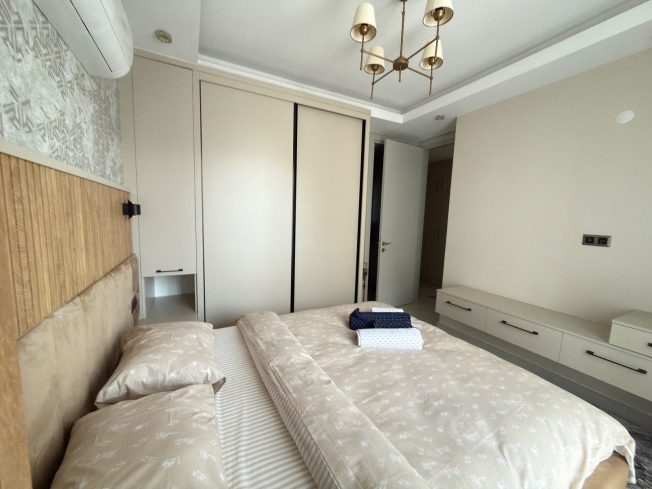 Просторная квартира 2+1 с панорамным видом на море в самом центре Махмутлара!