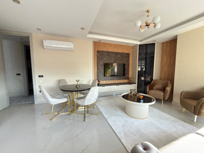 Просторная квартира 2+1 с панорамным видом на море в самом центре Махмутлара!