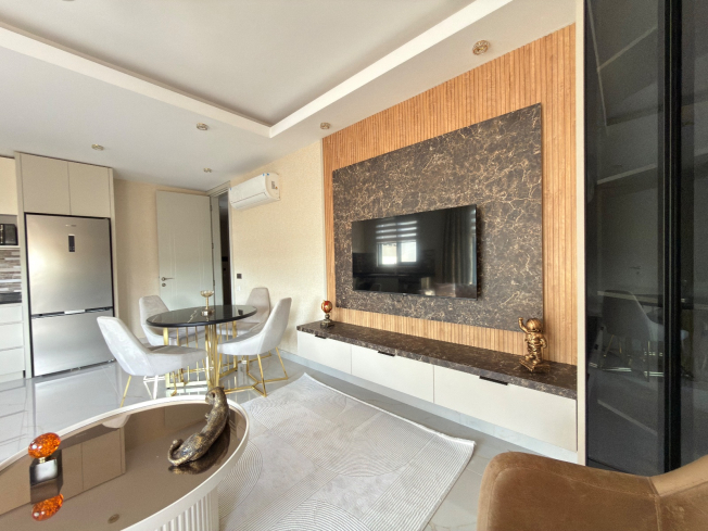 Просторная квартира 2+1 с панорамным видом на море в самом центре Махмутлара!