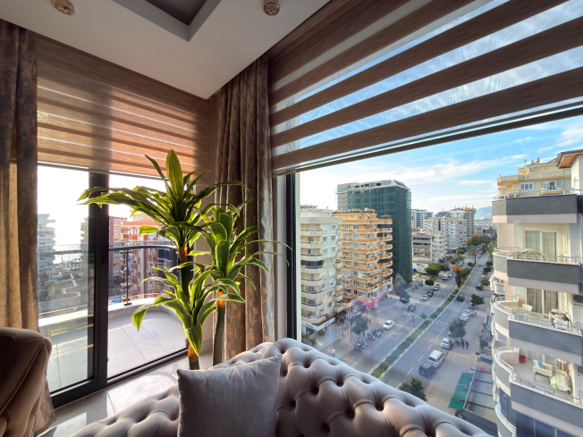 Просторная квартира 2+1 с панорамным видом на море в самом центре Махмутлара!