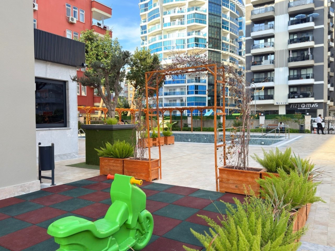 Просторная квартира 2+1 с панорамным видом на море в самом центре Махмутлара!