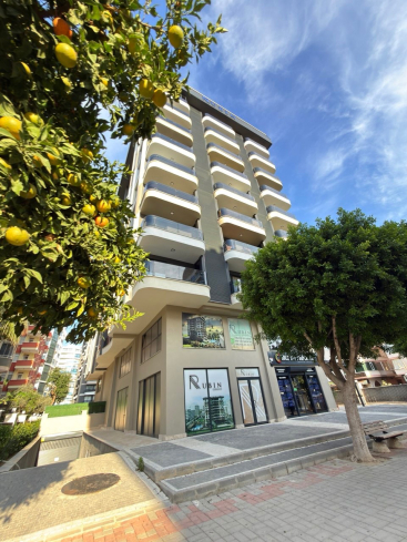 Просторная квартира 2+1 с панорамным видом на море в самом центре Махмутлара!