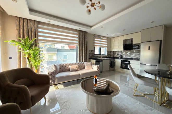 Просторная квартира 2+1 с панорамным видом на море в самом центре Махмутлара!