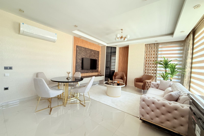 Просторная квартира 2+1 с панорамным видом на море в самом центре Махмутлара!