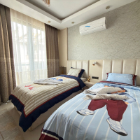 Просторная квартира 2+1 с панорамным видом на море в самом центре Махмутлара!