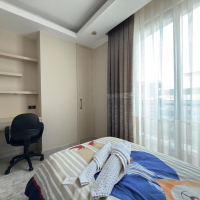 Просторная квартира 2+1 с панорамным видом на море в самом центре Махмутлара!