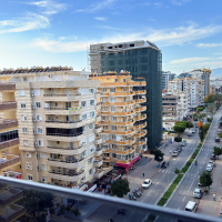 Просторная квартира 2+1 с панорамным видом на море в самом центре Махмутлара!