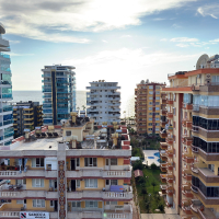 Просторная квартира 2+1 с панорамным видом на море в самом центре Махмутлара!