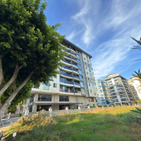 Просторная квартира 2+1 с панорамным видом на море в самом центре Махмутлара!