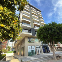 Просторная квартира 2+1 с панорамным видом на море в самом центре Махмутлара!