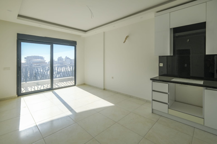 Современная квартира 1+1 в Махмутларе в новом комплексе с полной инфраструктурой Современная квартира 1+1 в Махмутларе в новом комплексе с полной инфраструктурой