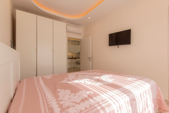 Уютная меблированная квартира 1+1 с видом на горы и богатой инфраструктурой Уютная меблированная квартира 1+1 с видом на горы и богатой инфраструктурой