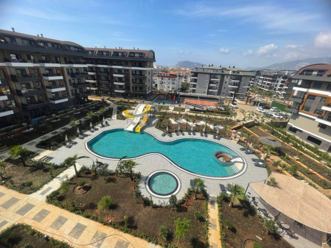 Меблированная квартира 2+1 у моря с роскошной инфраструктурой и рассрочкой на 2 года