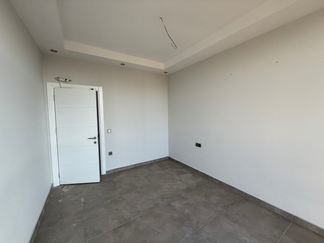 Современная квартира 1+1 с видом на море и горы в Махмутларе по выгодной цене