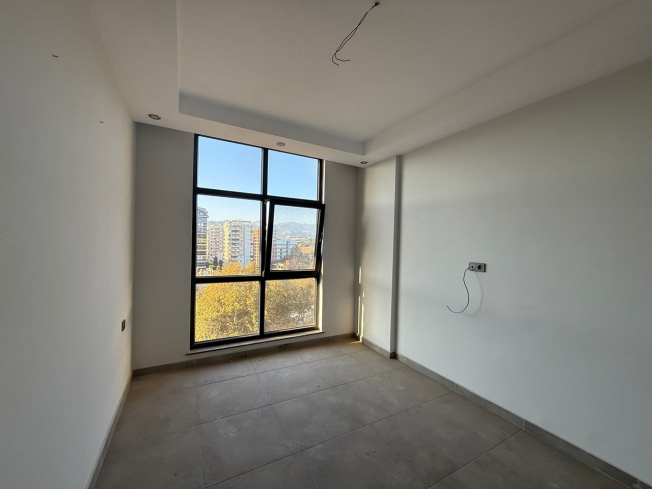 Современная квартира 1+1 с видом на море и горы в Махмутларе по выгодной цене