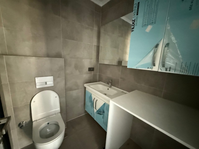 Современная квартира 1+1 с видом на море и горы в Махмутларе по выгодной цене