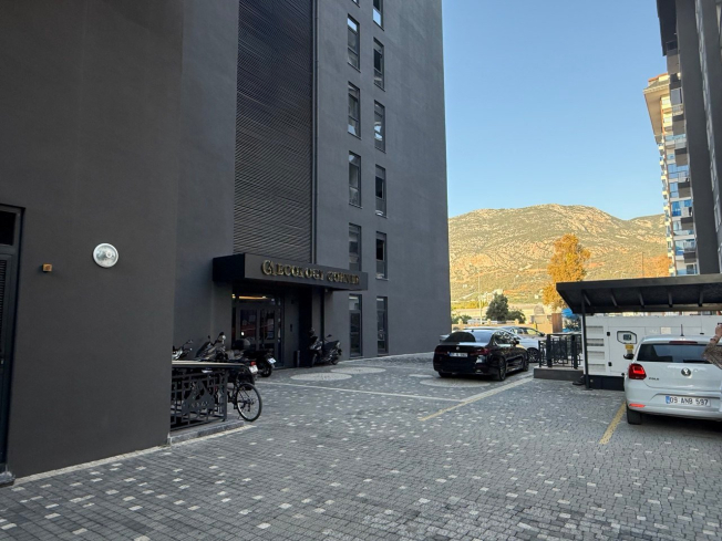 Современная квартира 1+1 с видом на море и горы в Махмутларе по выгодной цене