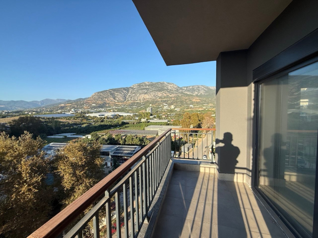 Современная квартира 1+1 с видом на море и горы в Махмутларе по выгодной цене