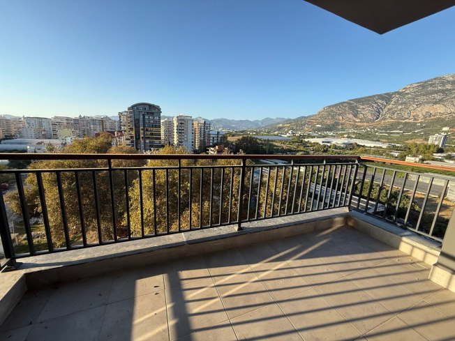 Современная квартира 1+1 с видом на море и горы в Махмутларе по выгодной цене