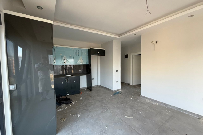 Современная квартира 1+1 с видом на море и горы в Махмутларе по выгодной цене