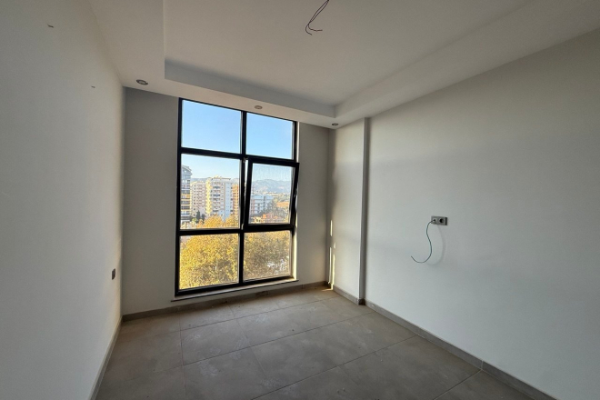 Современная квартира 1+1 с видом на море и горы в Махмутларе по выгодной цене