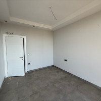 Современная квартира 1+1 с видом на море и горы в Махмутларе по выгодной цене