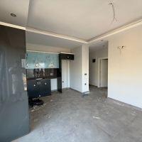 Современная квартира 1+1 с видом на море и горы в Махмутларе по выгодной цене