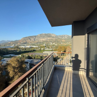 Современная квартира 1+1 с видом на море и горы в Махмутларе по выгодной цене