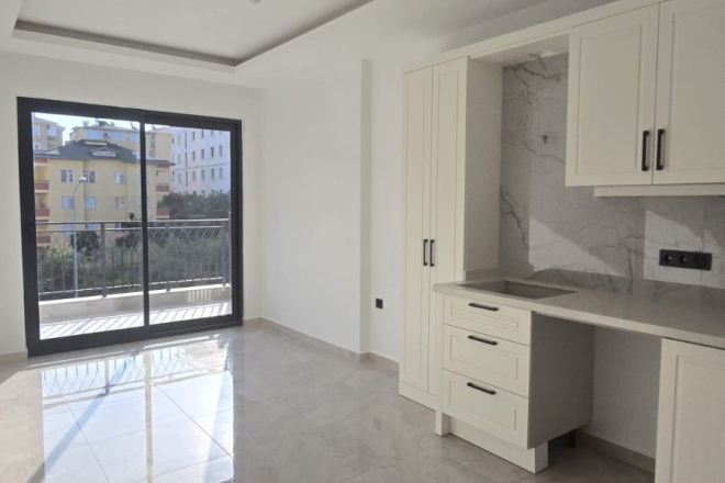 Стильная квартира 1+1 в районе Оба — 600 м до моря, премиум-комплекс, возможна под краткосрочную аренду