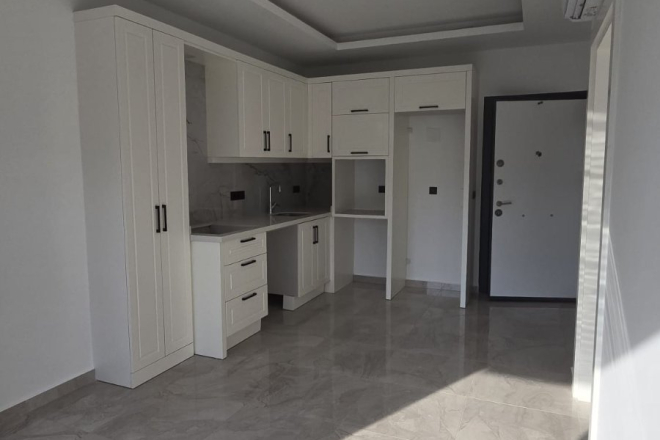 Стильная квартира 1+1 в районе Оба — 600 м до моря, премиум-комплекс, возможна под краткосрочную аренду