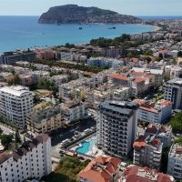 Стильная квартира 1+1 в районе Оба — 600 м до моря, премиум-комплекс, возможна под краткосрочную аренду